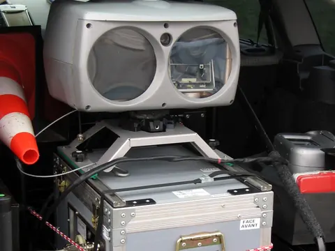 A mobile speed radar mounted in the boot of a police car