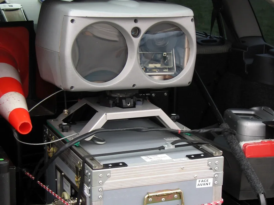 A mobile speed radar mounted in the boot of a police car